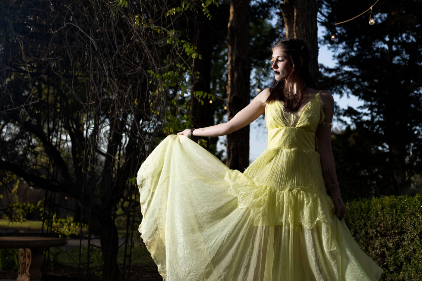 puff_pass_pose-yellow dressed-dark-themed-castle-falls-shoot-oklahoma-city-ok