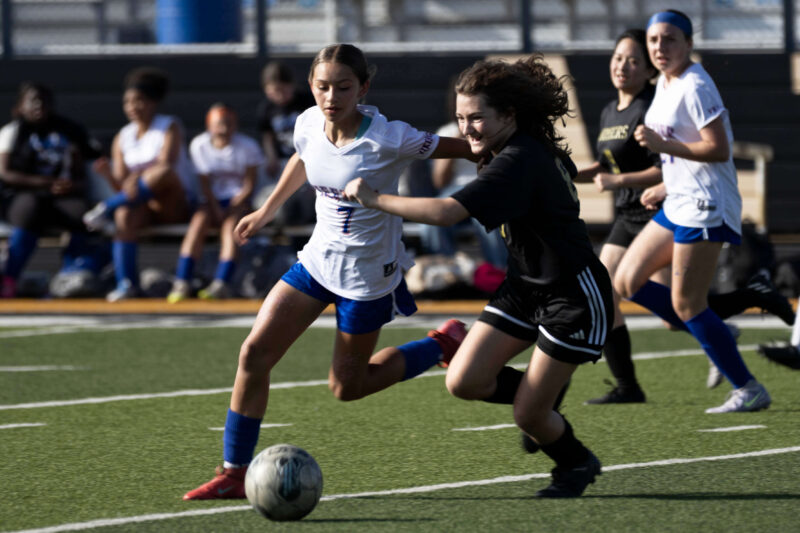 girls soccer fast break with defender chasing attacker Oklahoma City photography