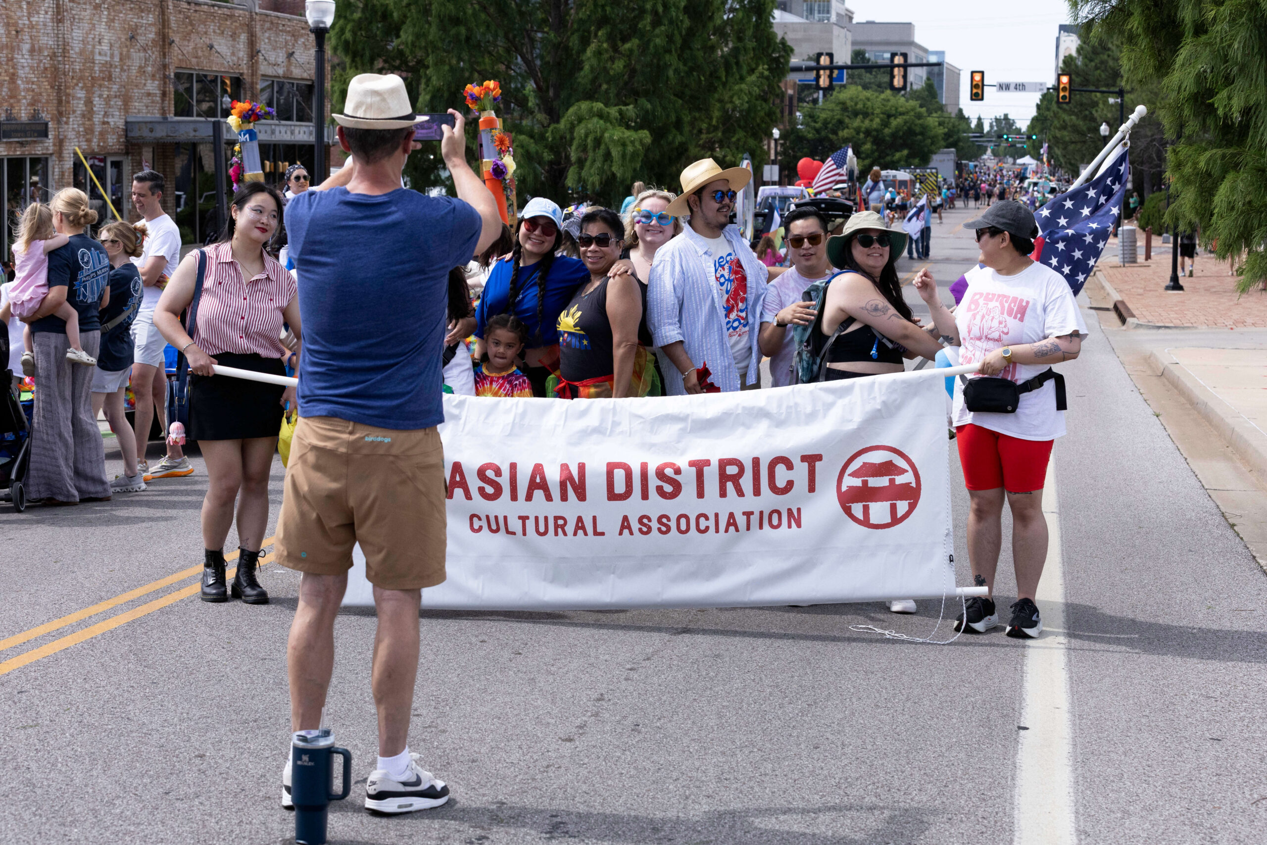 Members of the Asian District Cultural Association pose together during the Oklahoma City Pride Parade.