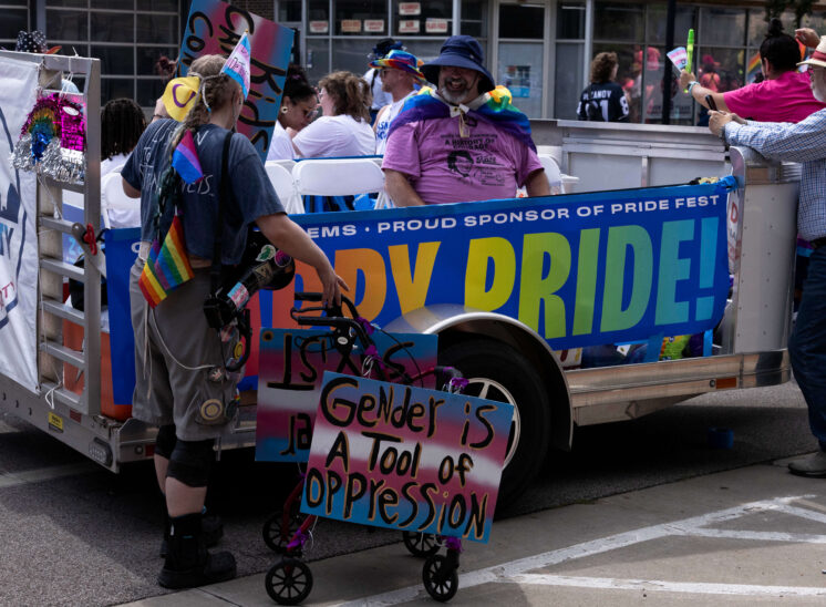 Decorated parade trailer carrying participants during the Oklahoma City Pride Parade.