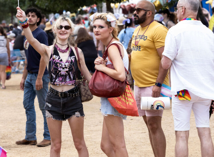 Festival attendees stand together among the crowd during Oklahoma City Pride.