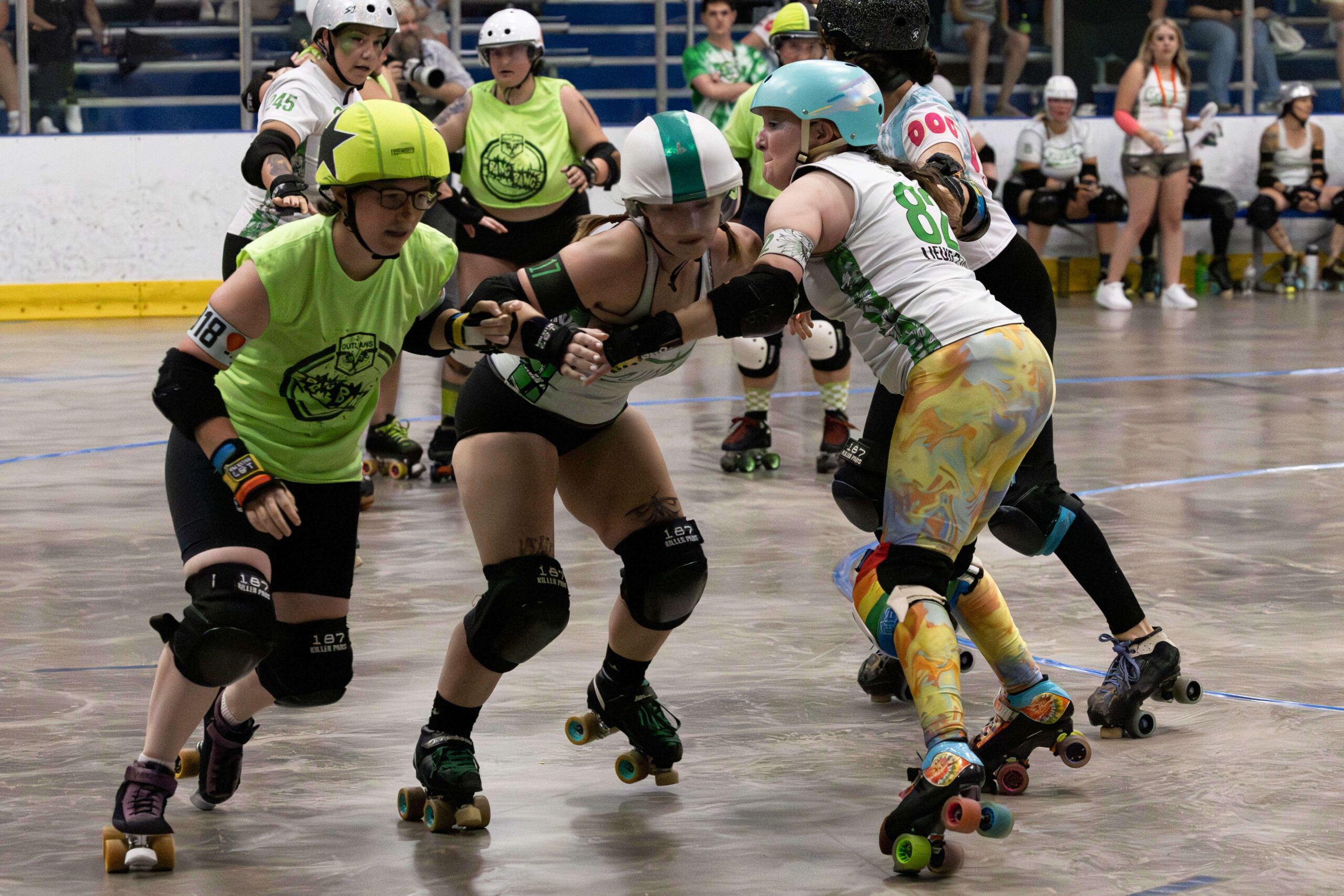 Twister City Roller Derby Outlaws skater skates alone on the track during a bout against the Capital City Crushers.