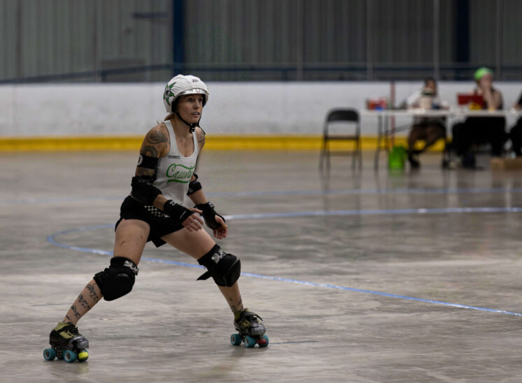 Capital City Crushers jammer skates alone on the track preparing for the next phase of play.