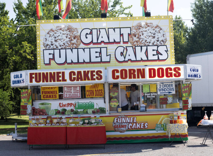 Funnel cake and corn dog stand operating during Yukon Freedom Fest.