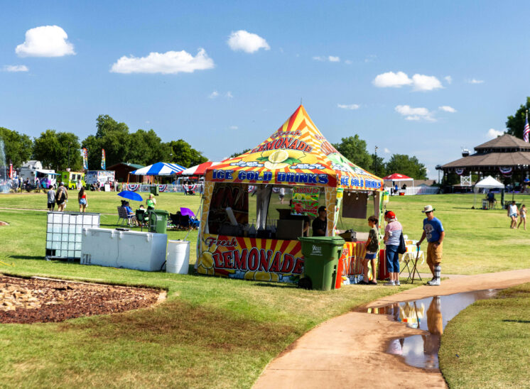 Lemonade vendor tent serving cold drinks at Yukon Freedom Fest.