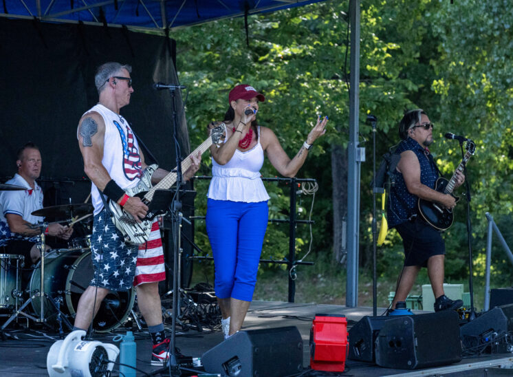 Members of Super Freak performing live on stage during Yukon Freedom Fest.