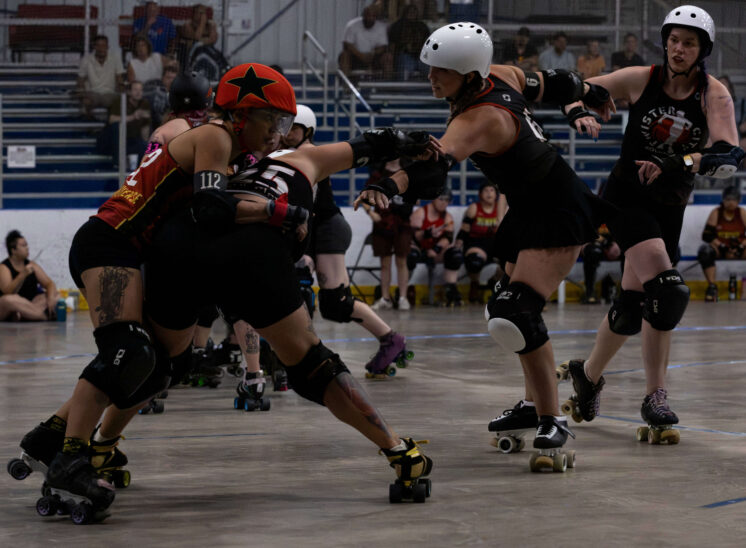 Memphis A jammer attempts to break free while Twister City blockers close the gap.